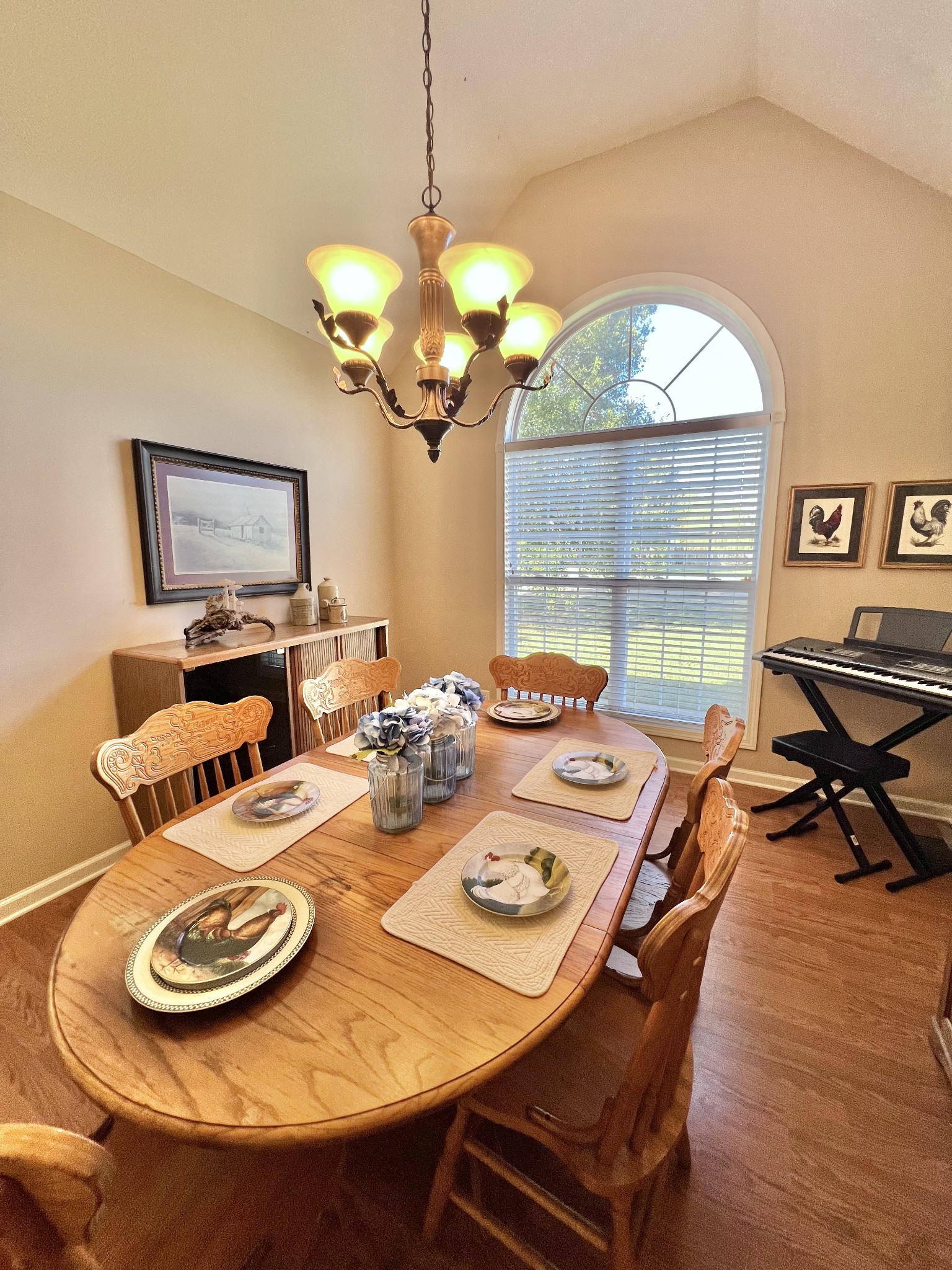 291 Bailey Lane Pleasant View, TN 37146 - Photo 10 of 37 a view of a dining room with furniture wooden floor and chandelier