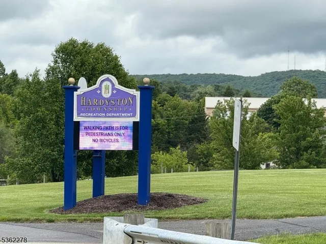 a sign that is on the side of a road