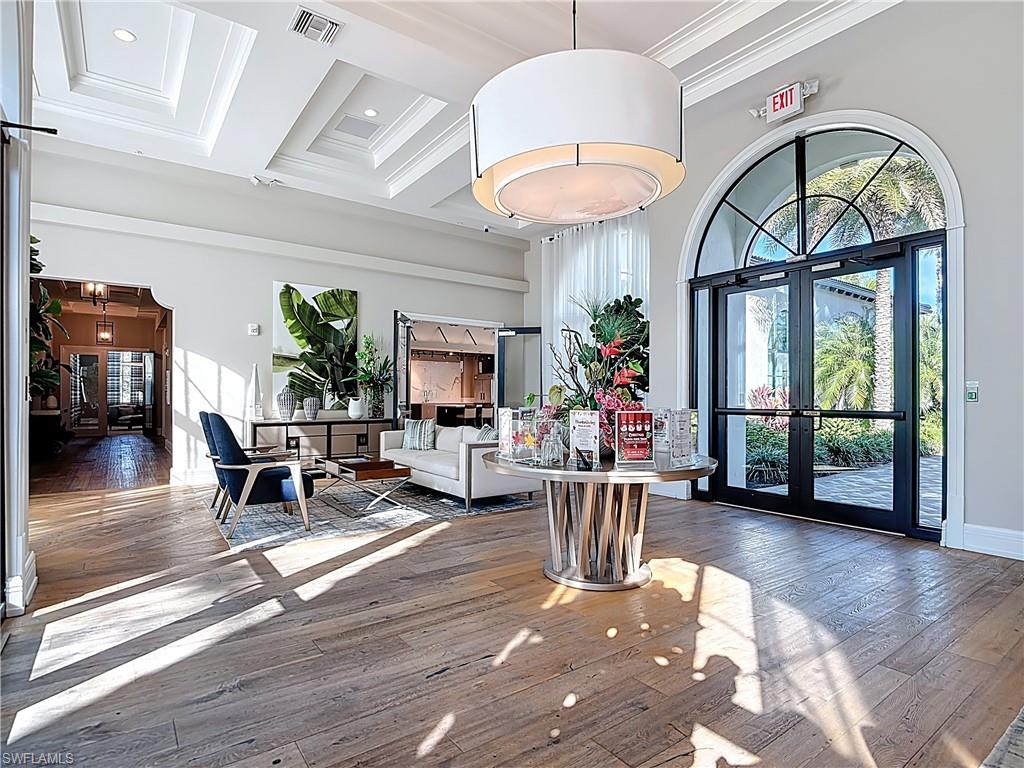 5123 Genoa Street Ave Maria, FL 34142 - Photo 21 of 34 a view of a dining room with furniture window and wooden floor