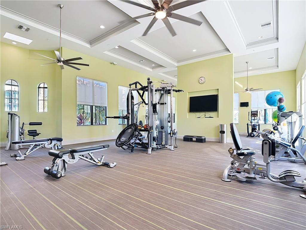 5123 Genoa Street Ave Maria, FL 34142 - Photo 30 of 34 a view of a room with gym equipment