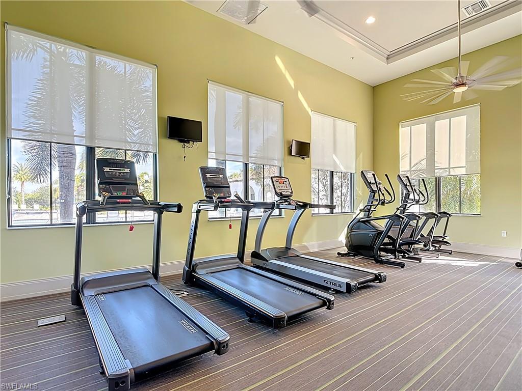 5123 Genoa Street Ave Maria, FL 34142 - Photo 31 of 34 a view of a room with gym equipment