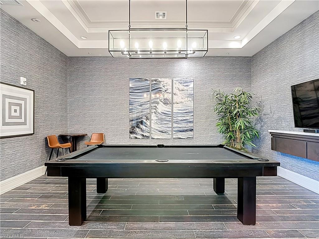 5123 Genoa Street Ave Maria, FL 34142 - Photo 32 of 34 a view of a room with a table and chairs