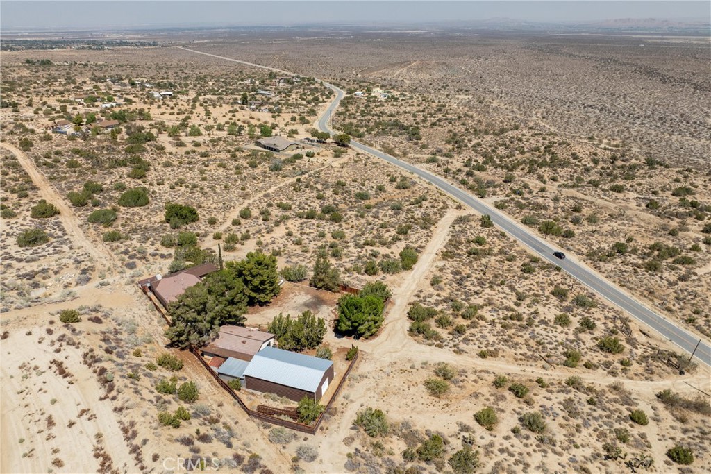 32451 Valyermo Road Pearblossom, CA 93553 - Photo 32 of 38 an aerial view of a house with a yard