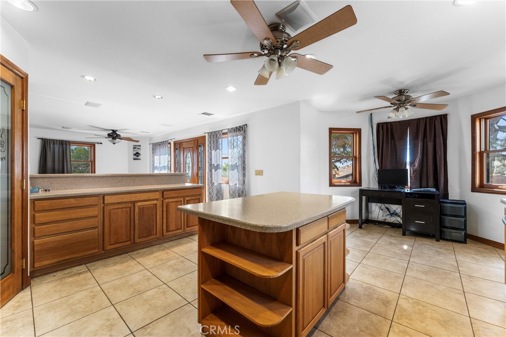 32451 Valyermo Road Pearblossom, CA 93553 - Photo 7 of 38 a kitchen with a cabinets and appliances