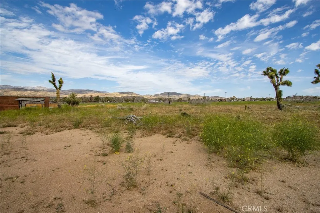 52550 Geronimo Road Pioneertown, CA 92268 - Photo 23 of 24 a view of a lake with beach