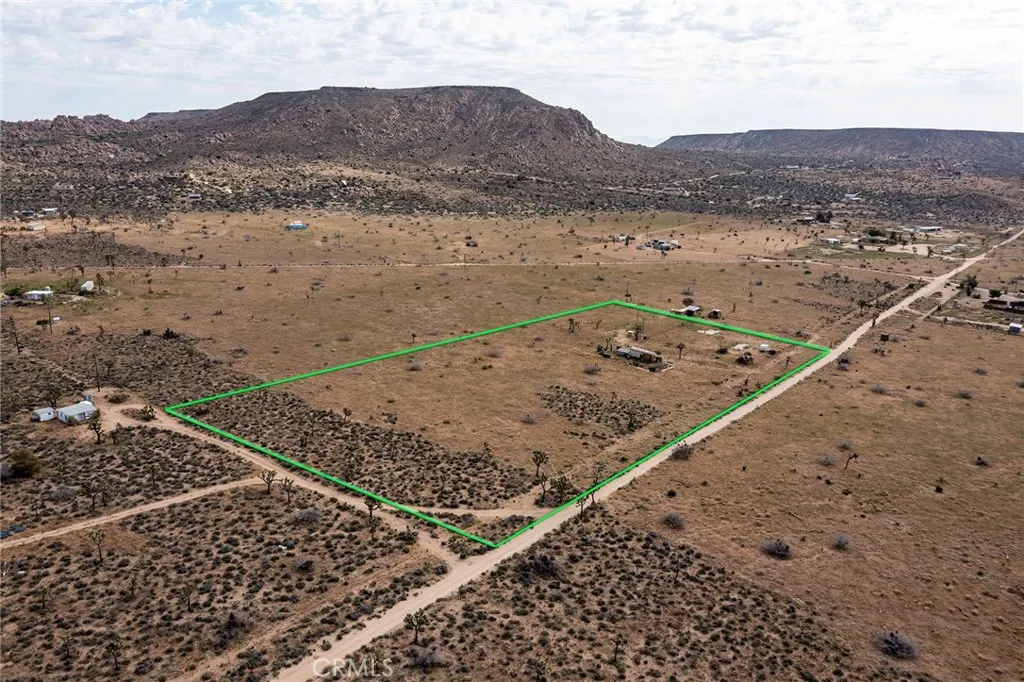52550 Geronimo Road Pioneertown, CA 92268 - Photo 7 of 24 a view of a lake with a mountain