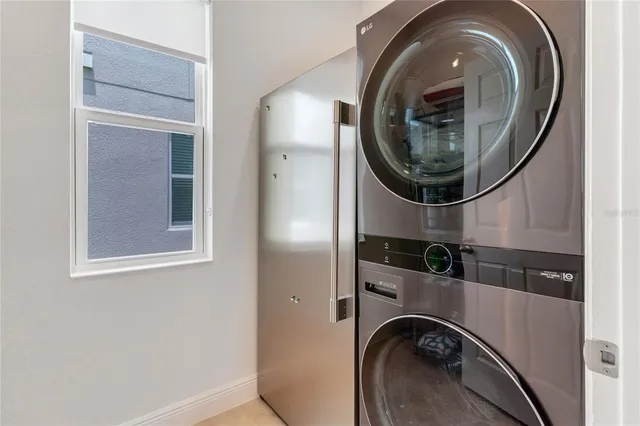 a close view of utility and utility room with washer and dryer
