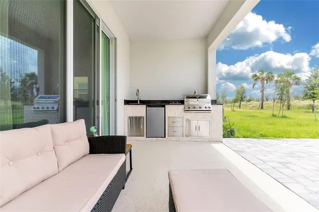 a view of a livingroom with furniture and porch