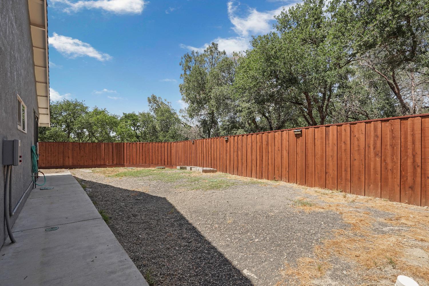 8760 Greer Way Valley Springs, CA 95252 - Photo 39 of 40 a backyard of a house