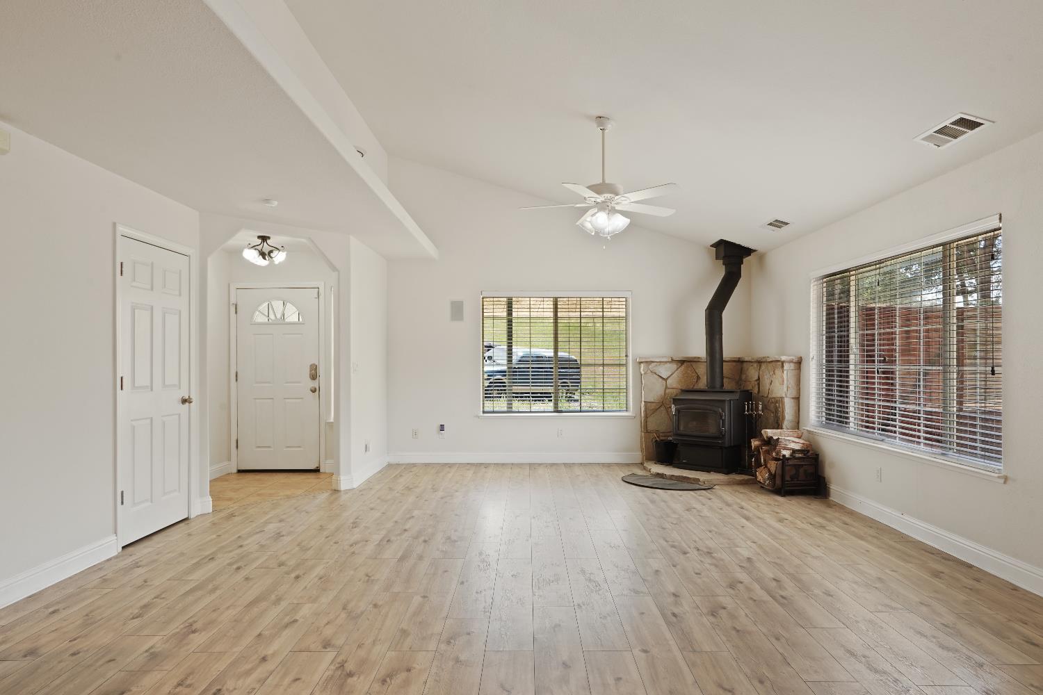 8760 Greer Way Valley Springs, CA 95252 - Photo 8 of 40 a view of livingroom with furniture wooden floor and window