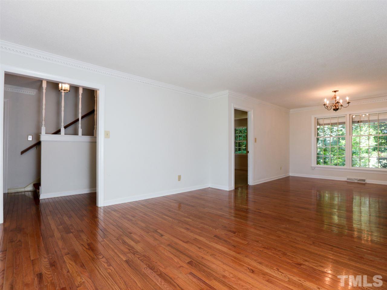 3429 Horton Street Raleigh, NC 27607 - Photo 4 of 25 Large family room with fireplace that overlooks your private back yard
