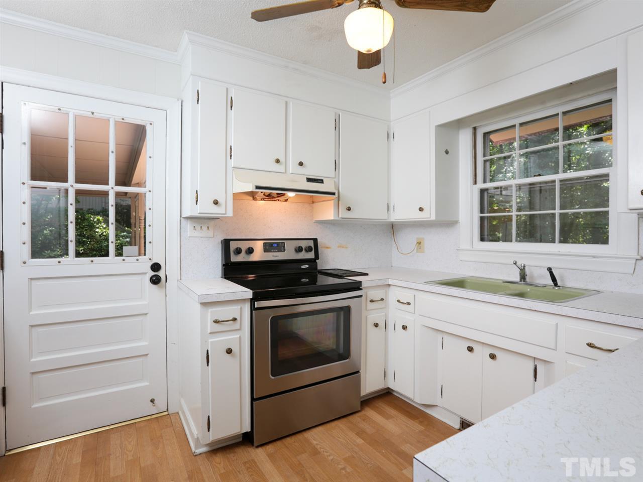 3429 Horton Street Raleigh, NC 27607 - Photo 8 of 25 Kitchen opens to carport and deck that is great for entertaining