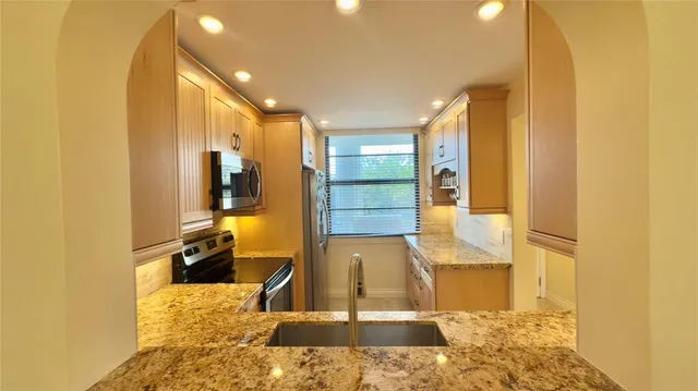 a bathroom with a tub and shower