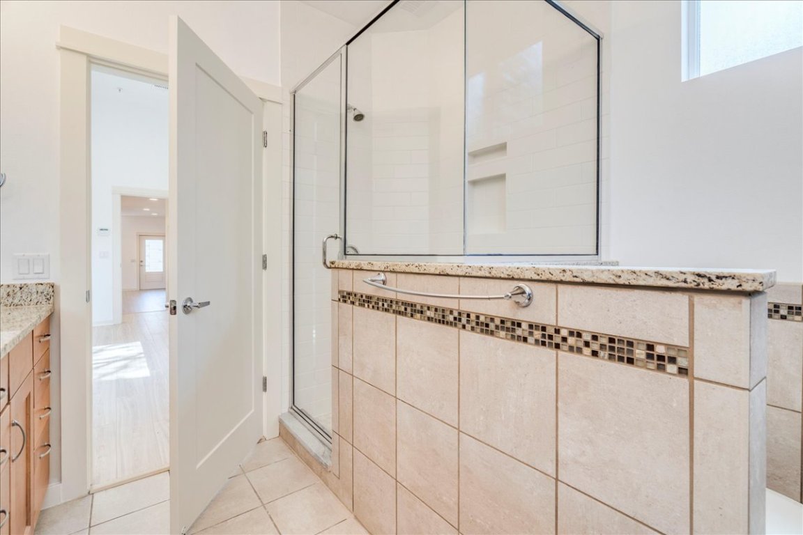 4006 Valley View Road, Unit B Austin, TX 78704 - Photo 10 of 32 a view of a bathroom with mirror