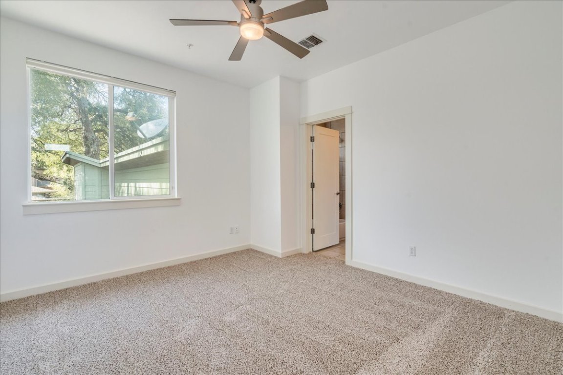 4006 Valley View Road, Unit B Austin, TX 78704 - Photo 16 of 32 a view of an empty room with a window