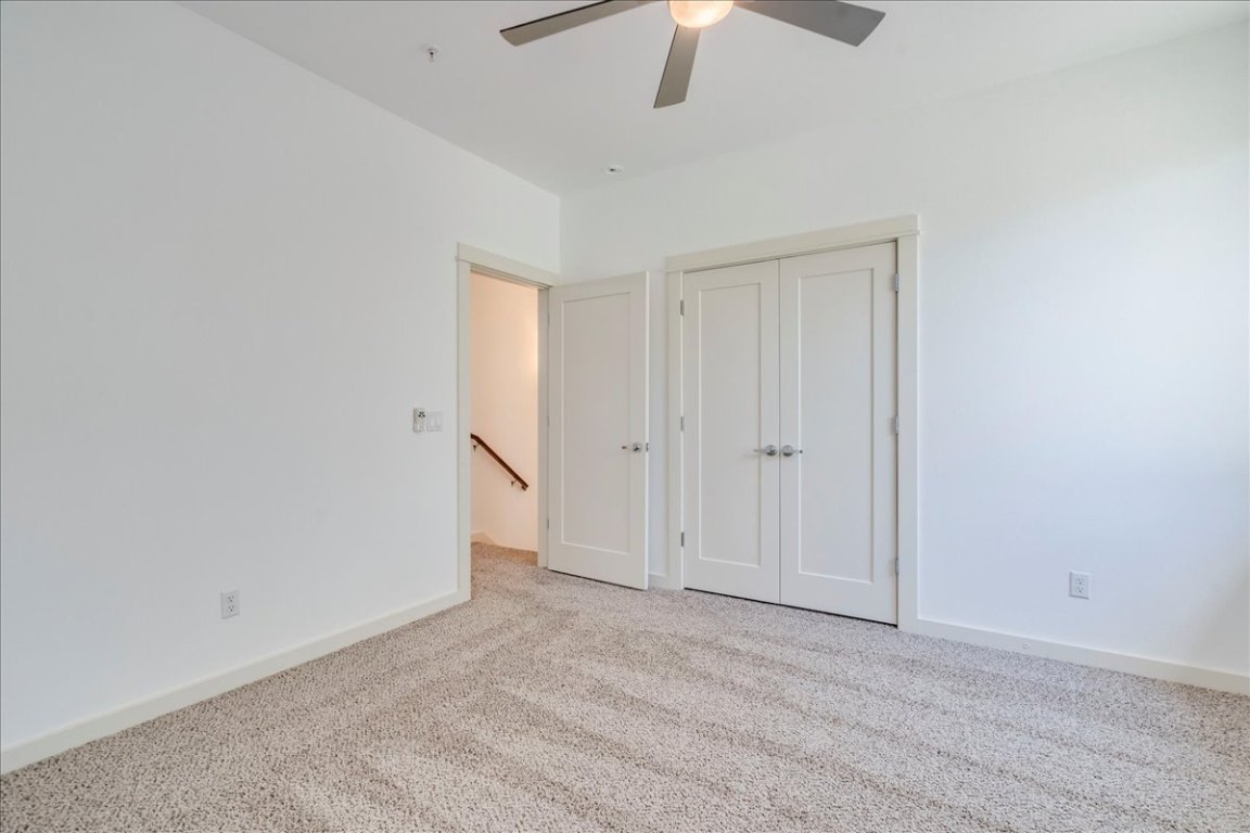 4006 Valley View Road, Unit B Austin, TX 78704 - Photo 17 of 32 an empty room with a ceiling fan