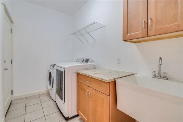 an empty room with a ceiling fan