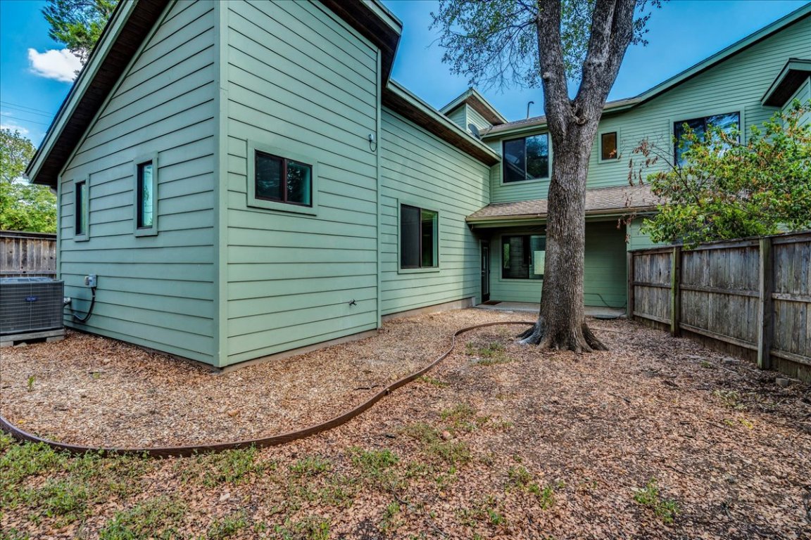4006 Valley View Road, Unit B Austin, TX 78704 - Photo 23 of 32 a view of a house with a small yard and tree