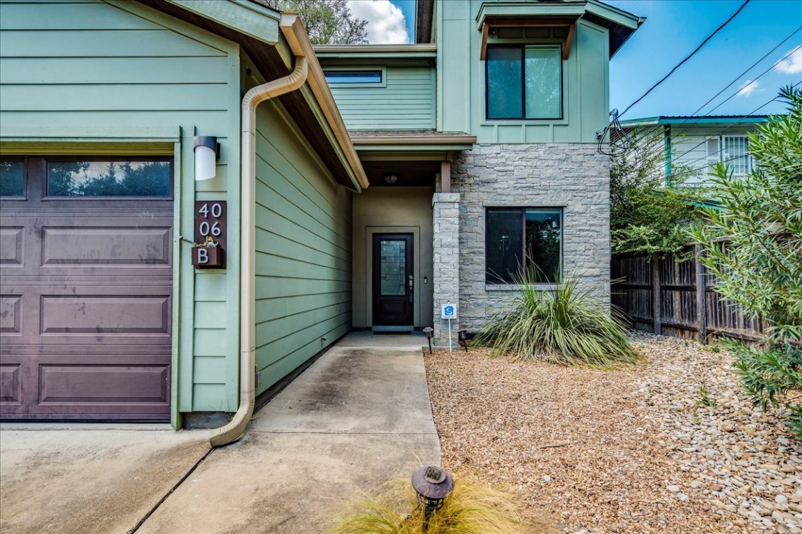 4006 Valley View Road, Unit B Austin, TX 78704 - Photo 28 of 32 a front view of a house with a yard