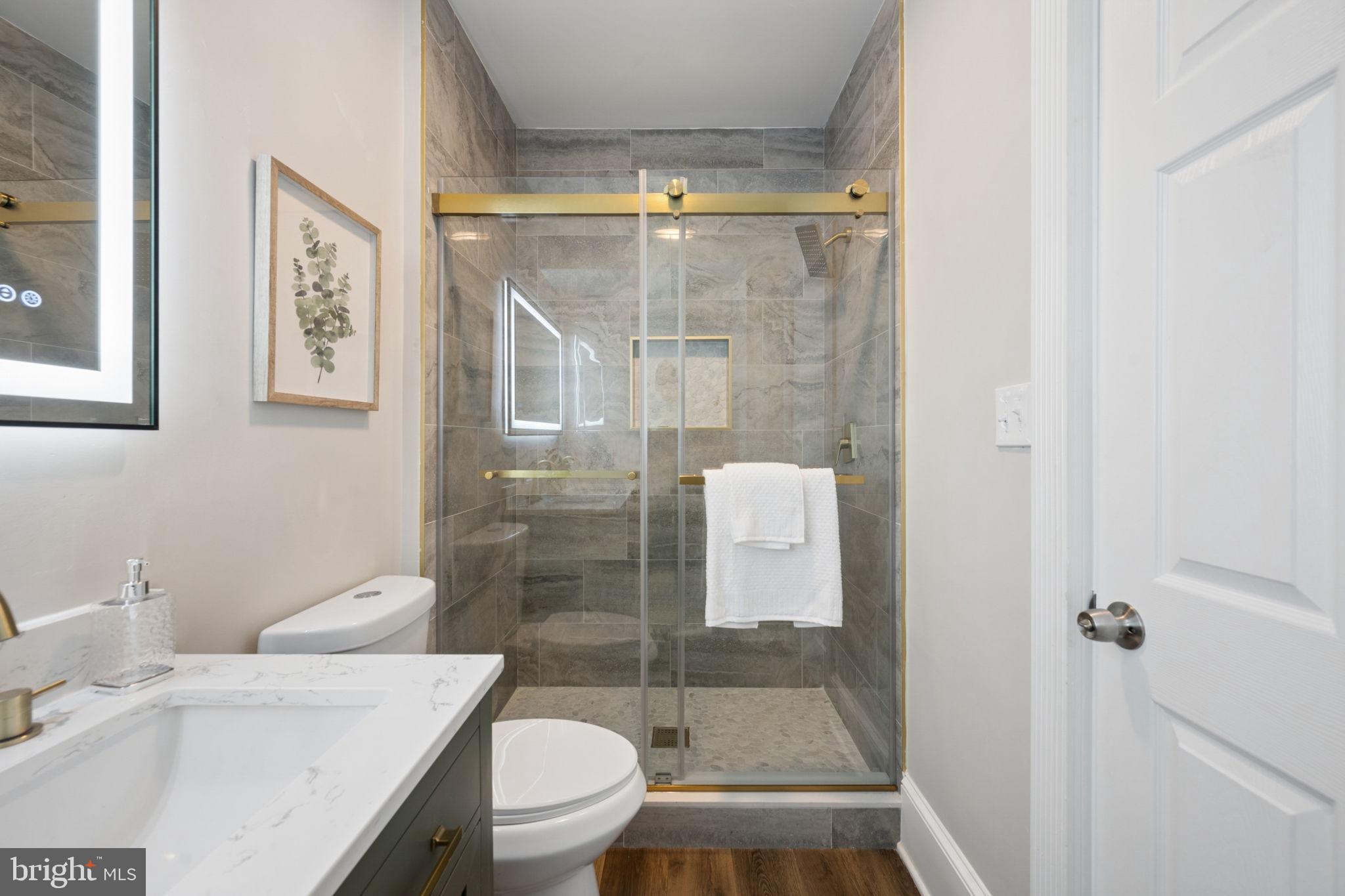 1108 South Clinton Street Baltimore, MD 21224 - Photo 32 of 66 Elegant bathroom with modern finishes.