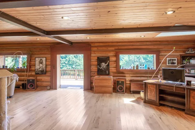 a view of balcony with furniture