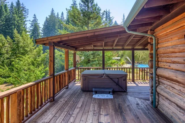 a bathroom with a tub and a shower