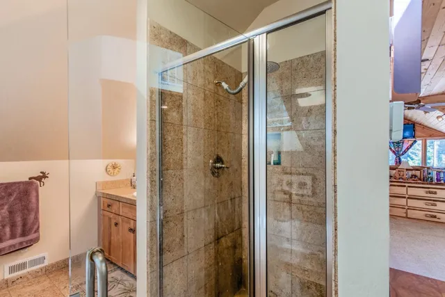 swimming pool view with a seating space