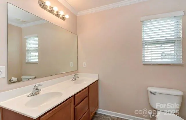 a bathroom with a toilet and a bathtub