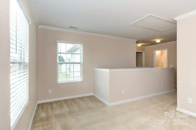 an empty room with windows