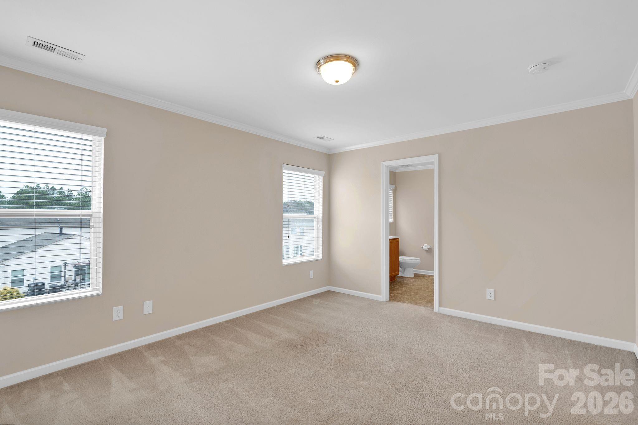 13718 Porter Creek Road Charlotte, NC 28262 - Photo 31 of 45 a view of an empty room with a window