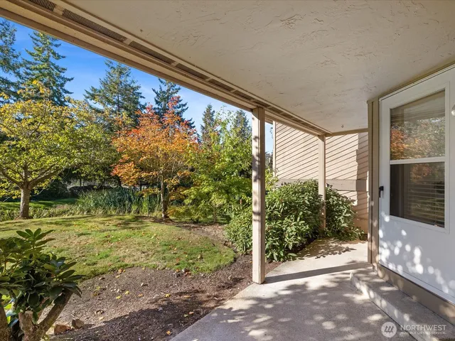 a view of backyard with green space