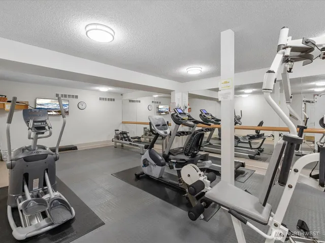 a view of a room with gym equipment