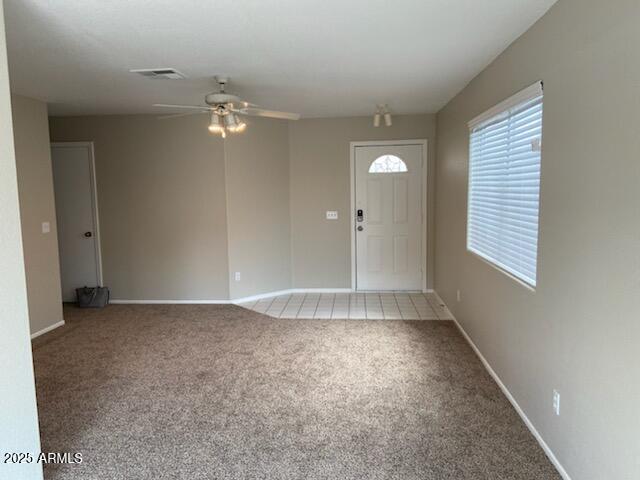 3233 West Abraham Lane Phoenix, AZ 85027 - Photo 3 of 13 a view of an empty room with a window