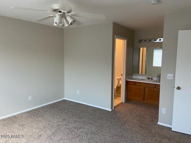 3233 West Abraham Lane Phoenix, AZ 85027 - Photo 9 of 13 a view of an empty room with a kitchen