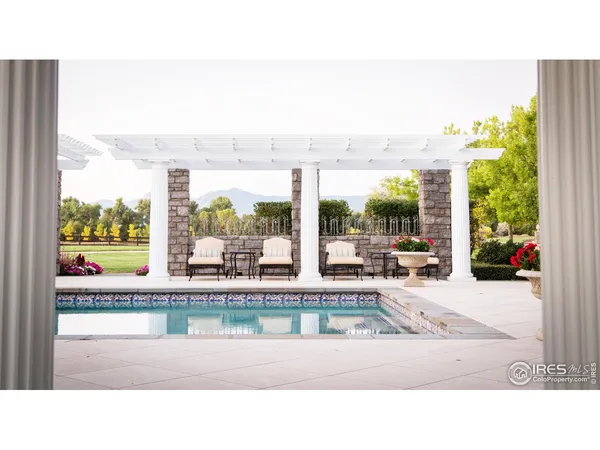 a dining room with furniture and a fireplace