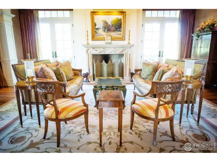 a view of swimming pool with seating space