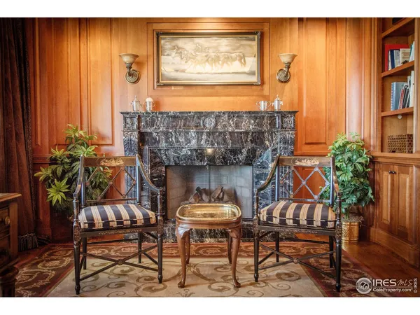 a terrace with outdoor seating and city view