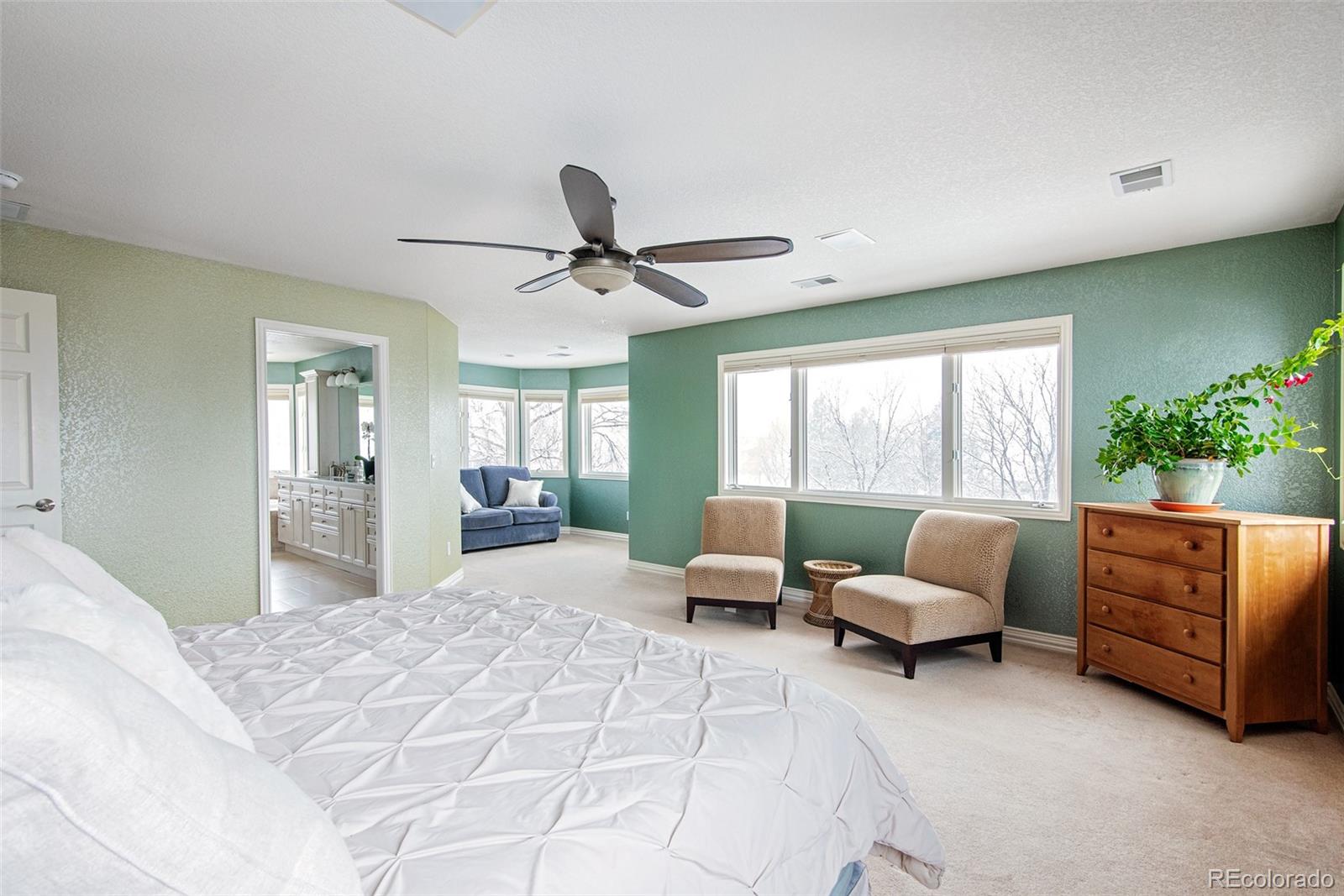 535 Sawtooth Point Lafayette, CO 80026 - Photo 20 of 40 a living room with furniture and windows