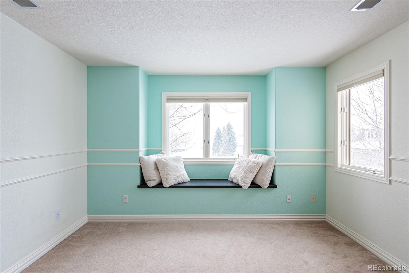 535 Sawtooth Point Lafayette, CO 80026 - Photo 25 of 40 a room with window and bed