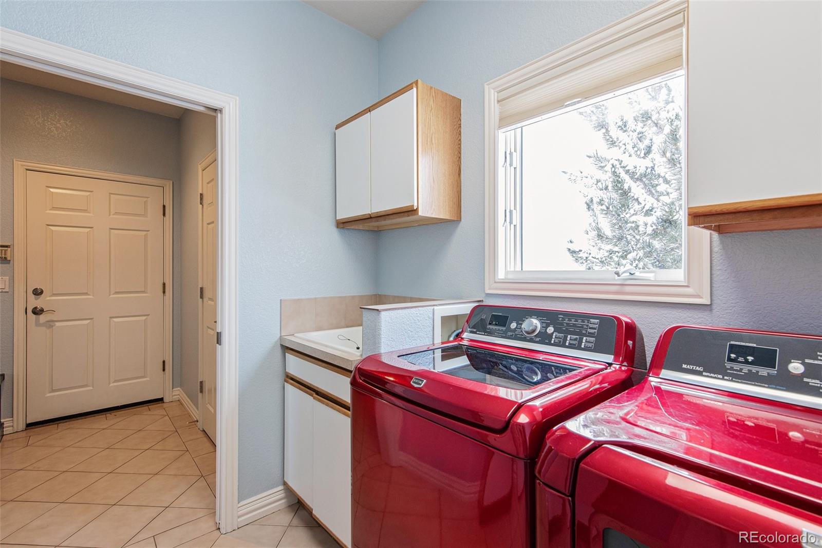 535 Sawtooth Point Lafayette, CO 80026 - Photo 29 of 40 a bed sitting in a kitchen next to a window