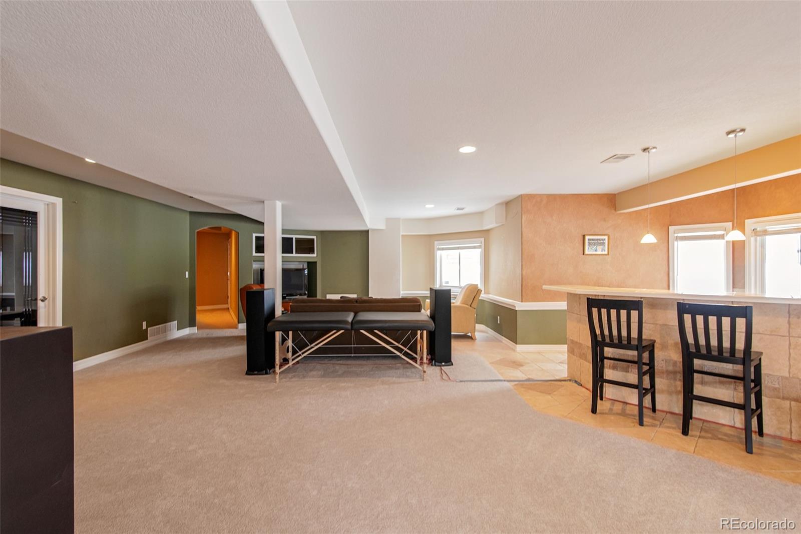 535 Sawtooth Point Lafayette, CO 80026 - Photo 30 of 40 a view of game room with windows