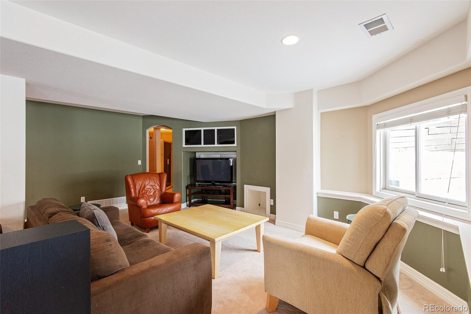 535 Sawtooth Point Lafayette, CO 80026 - Photo 33 of 40 a living room with furniture and a window