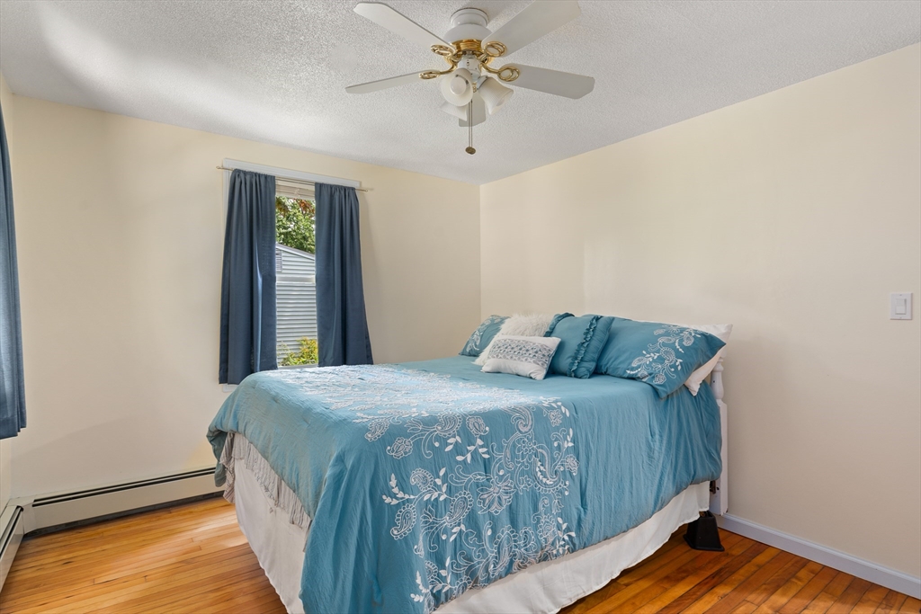 957 Ryan Road Northampton, MA 01062 - Photo 29 of 42 a bedroom with a bed and window