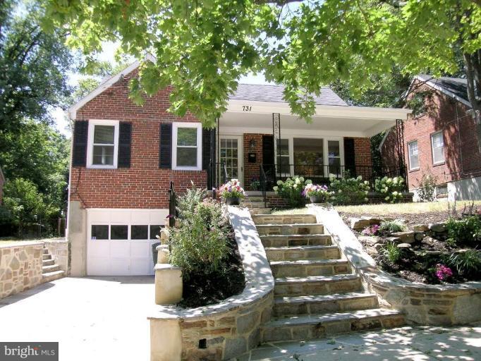 731 Overbrook Road Baltimore, MD 21212 - Photo 1 of 20 a front view of a house with a porch