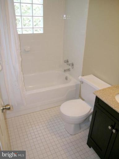 731 Overbrook Road Baltimore, MD 21212 - Photo 13 of 20 a white toilet sitting next to a bath tub