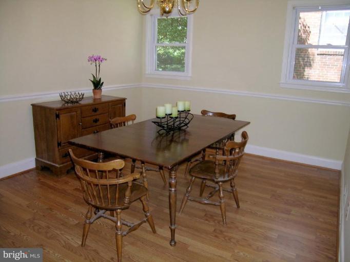 731 Overbrook Road Baltimore, MD 21212 - Photo 7 of 20 a view of a dining room with furniture and wooden floor