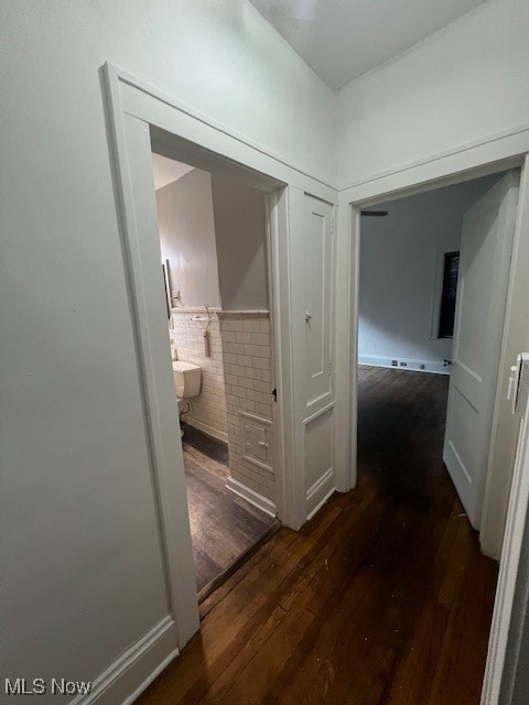 2915 Ludlow Road Cleveland, OH 44120 - Photo 39 of 50 Hall with dark wood-style flooring and wainscoting