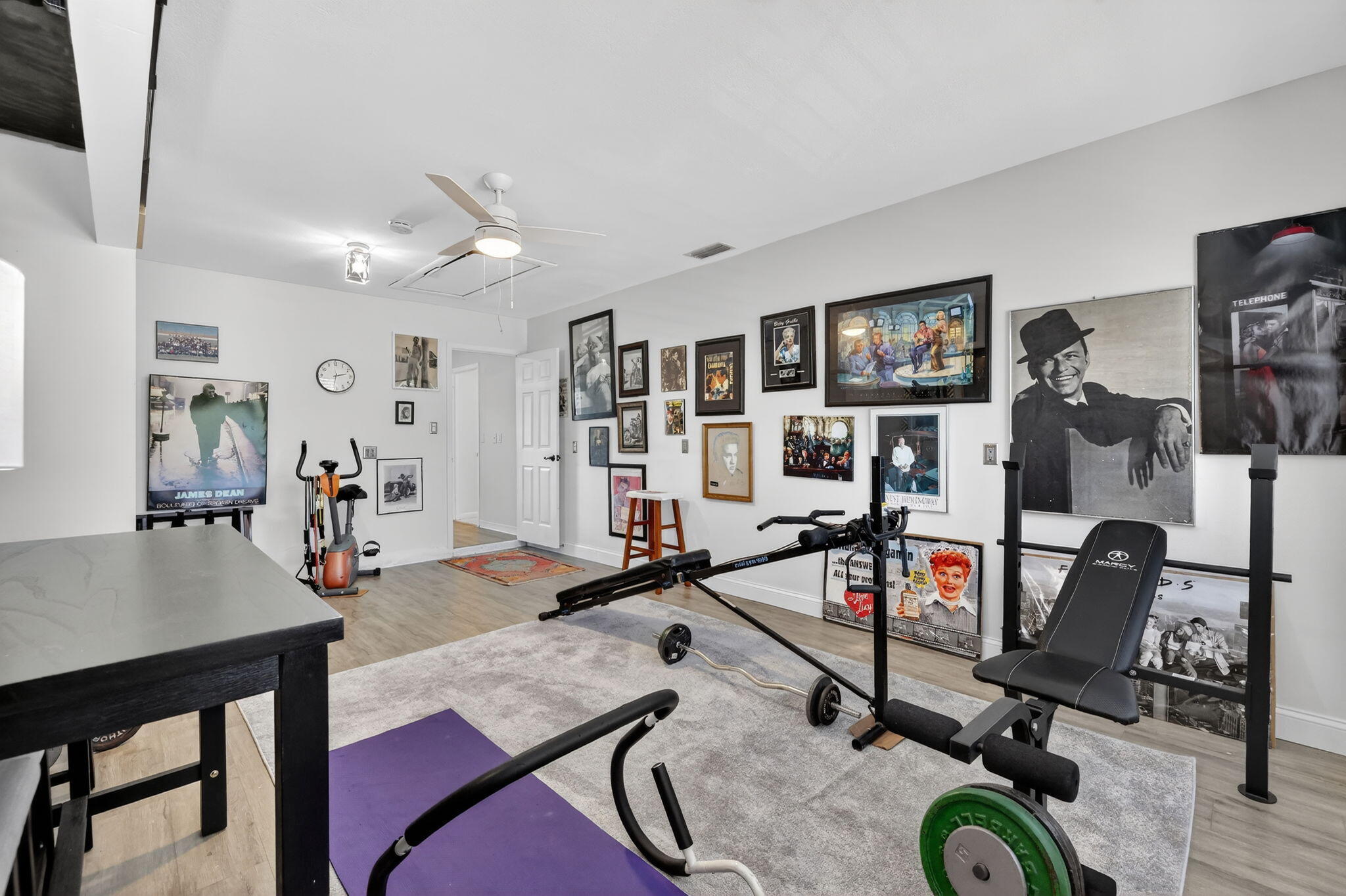 1252 East Madison Avenue Stuart, FL 34996 - Photo 26 of 43 a view of a livingroom with workspace and a couch