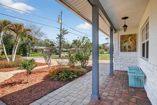a view of a porch with furniture