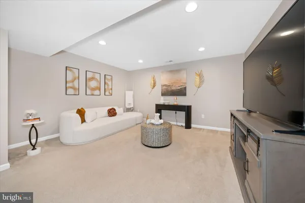 a living room with furniture and a couch